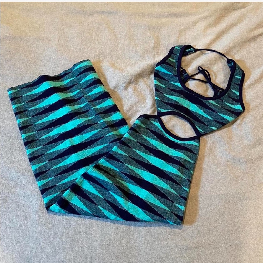 Knit midi dress with cutouts and open back